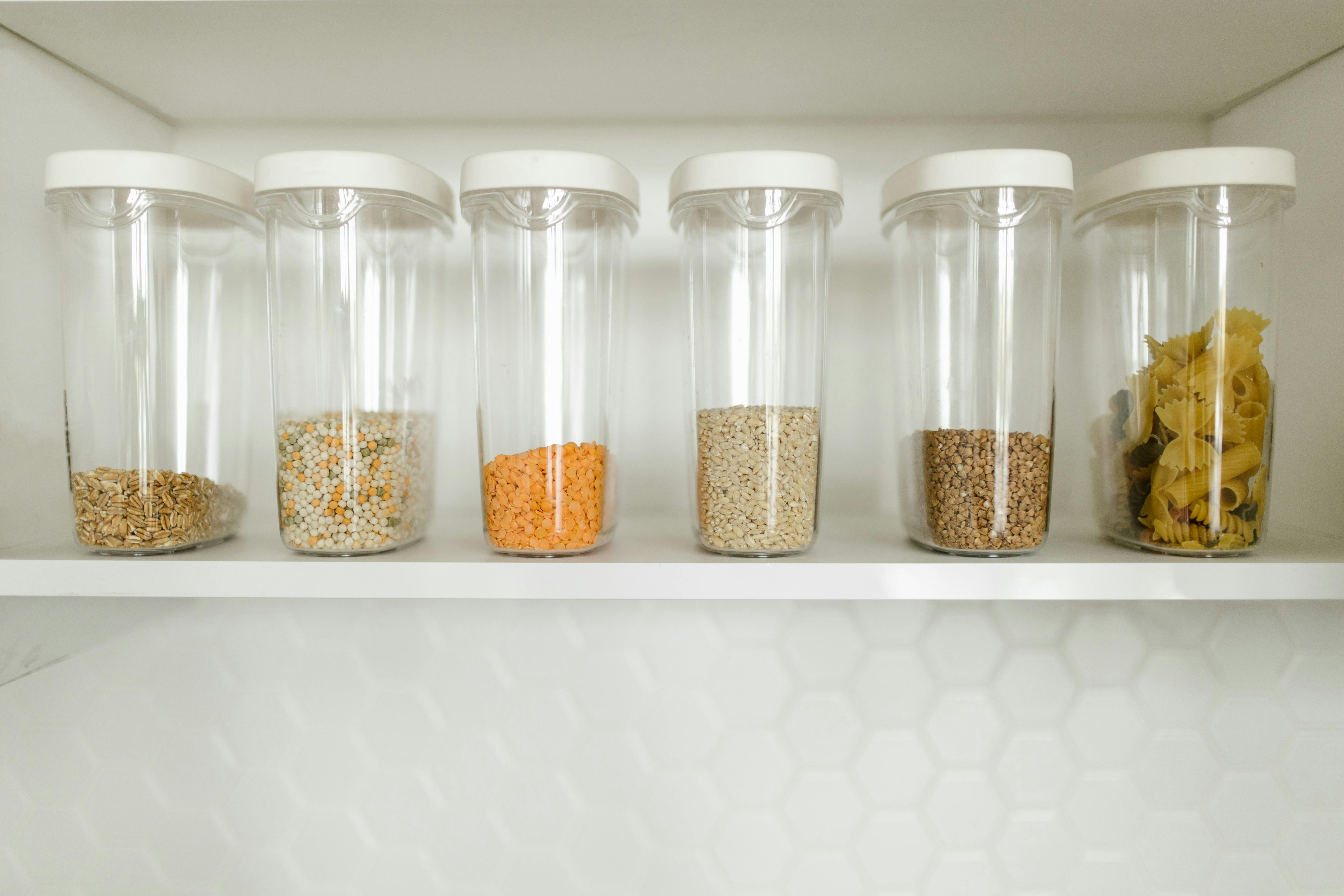 image of an organized pantry with identical containers, decluttering